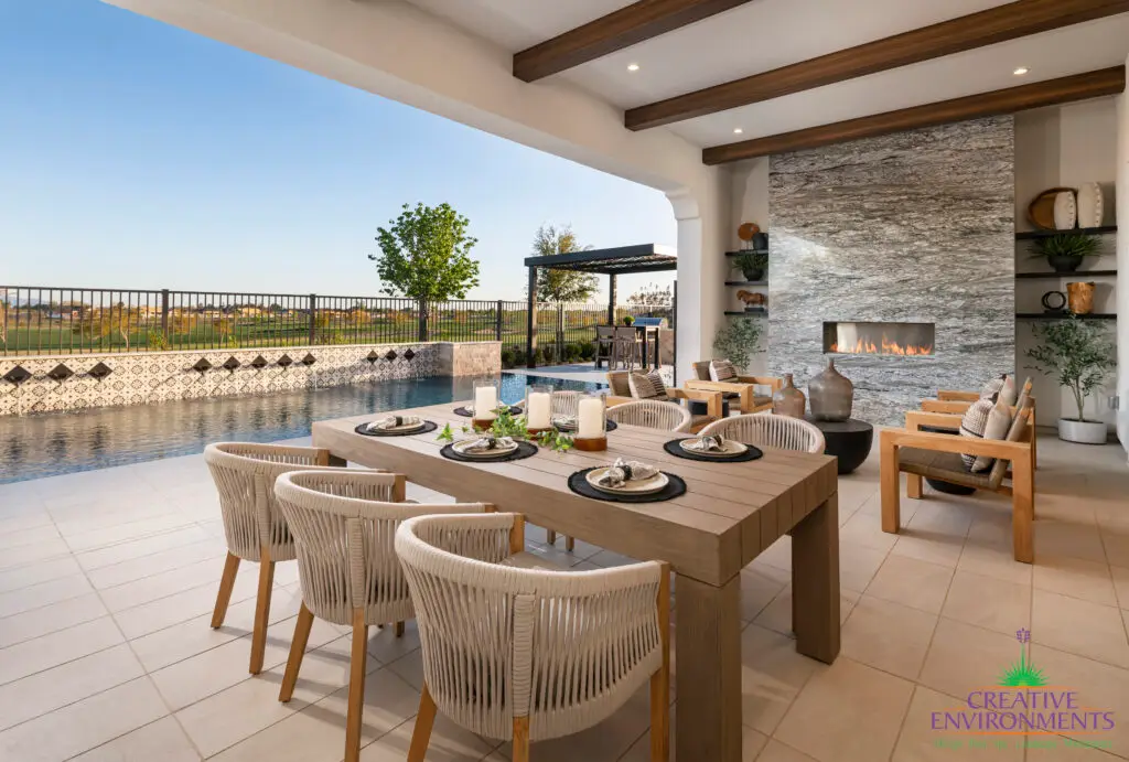 Backyard design with multiple seating areas and deco-tile pool.