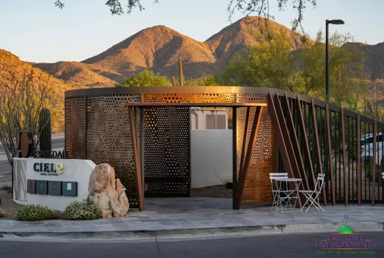 Custom community entranceway with unique metal shade structure that doubles as a metal statement piece.