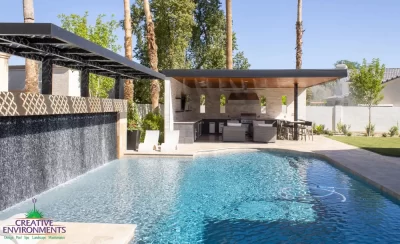 Backyard design with misters, outdoor kitchen and pool.